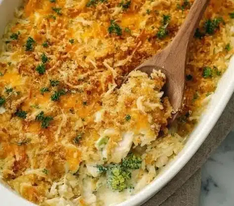 Delicious Chicken Rice Casserole served in a baking dish with fresh herbs