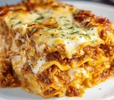 Lasagna 9 Delicious homemade lasagna with layers of cheese, meat, and sauce