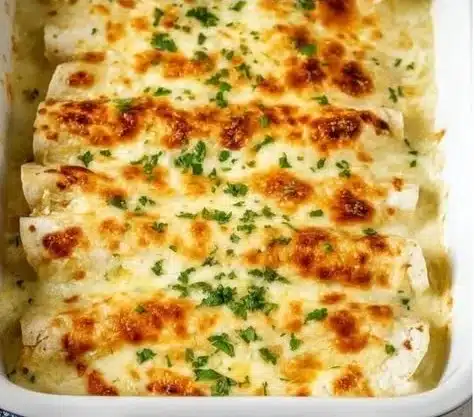 Delicious white chicken enchiladas served with fresh toppings